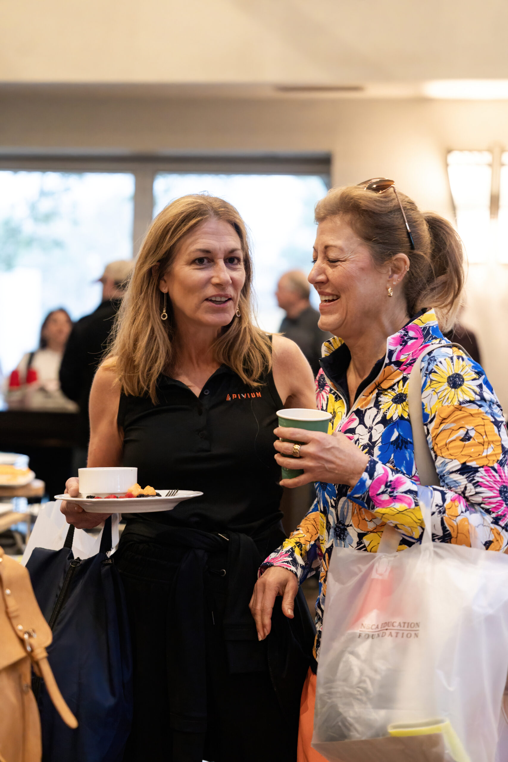 two woman chatting together